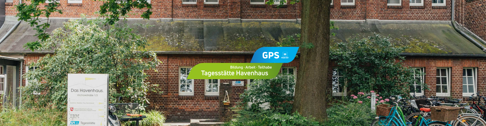 Haus mit Garten und Logo Tagesstätte Havenhaus.